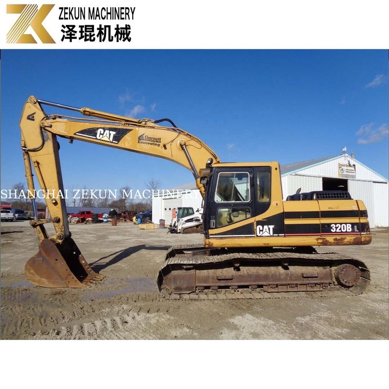 Erdgräben ermöglicht mit CAT 320 BL Bagger und 97 kW Caterpillar Motor